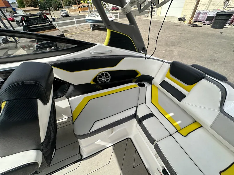 Slide: The Image of 2020 Yamaha 212X jet boat interior with stylish seating and modern design. - 18