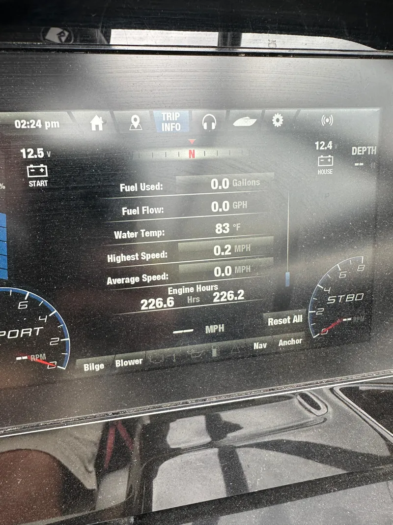 Slide: The Image of Dashboard of a 2020 Yamaha 212X jet boat showing trip information and engine stats. - 23