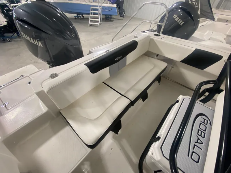 Slide: The Image of 2024 Robalo R202 Explorer boat interior with Yamaha engines. - 6