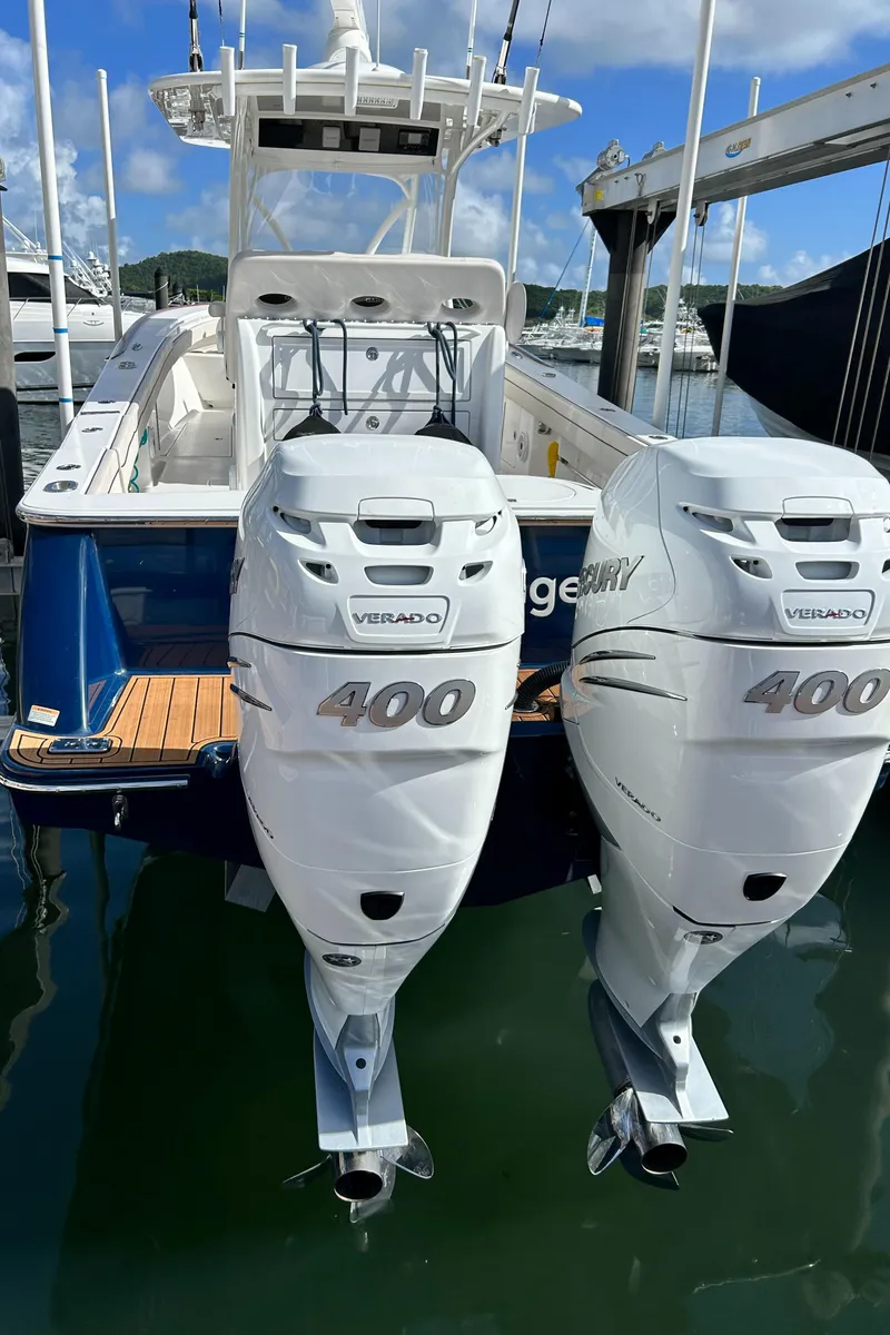 Slide: The Image of 2022 Valhalla Boatworks V-33 with twin 400 horsepower engines docked at marina. - 10