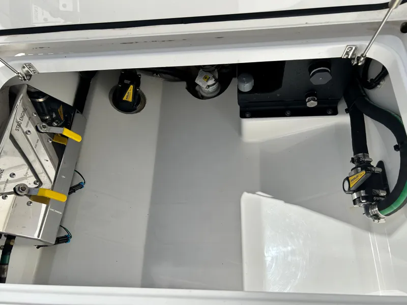 Slide: The Image of 2022 Valhalla Boatworks V-33 storage compartment with mechanical components and wiring. - 4