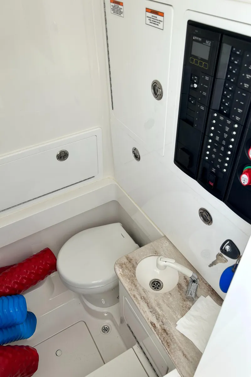 Slide: The Image of 2022 Valhalla V-33 boat interior with toilet and control panel. - 8