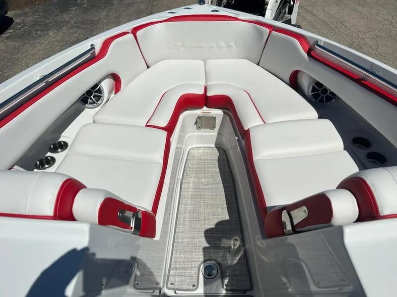 Slide: The Image of 2023 Crownline 260 SS boat interior with white and red seating. - 6