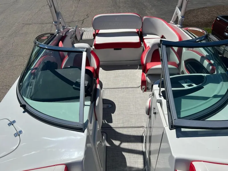 Slide: The Image of 2023 Crownline 260 SS boat interior with red and white seating. - 7