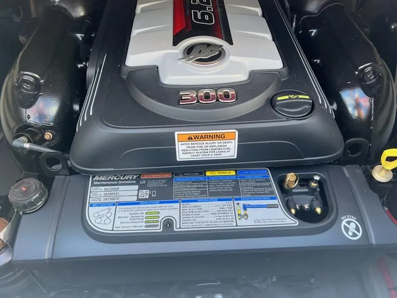 Slide: The Image of 2023 Crownline 260 SS boat engine close-up. - 8