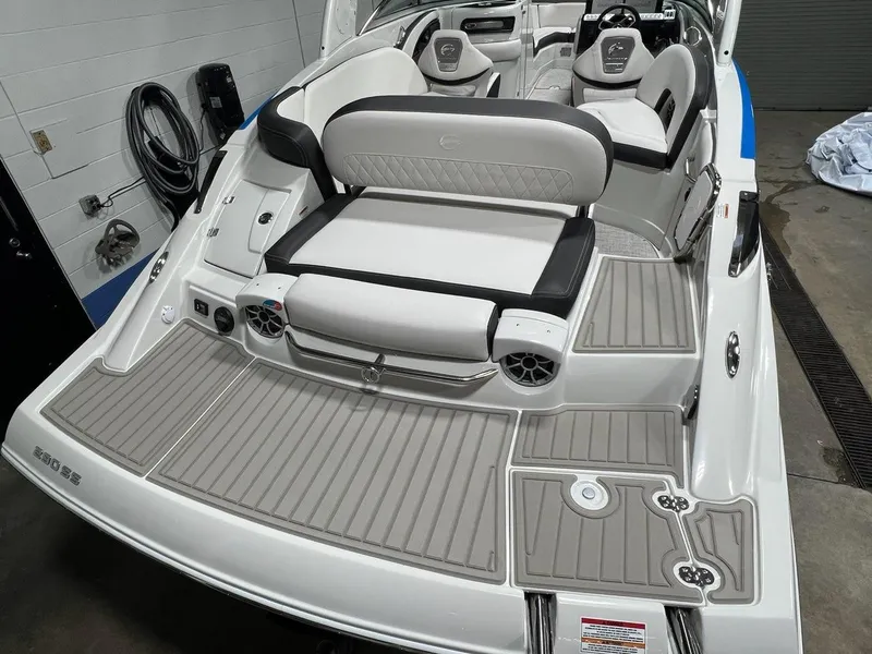 Slide: The Image of 2023 Crownline 290 SS boat interior with seating and speakers. - 3