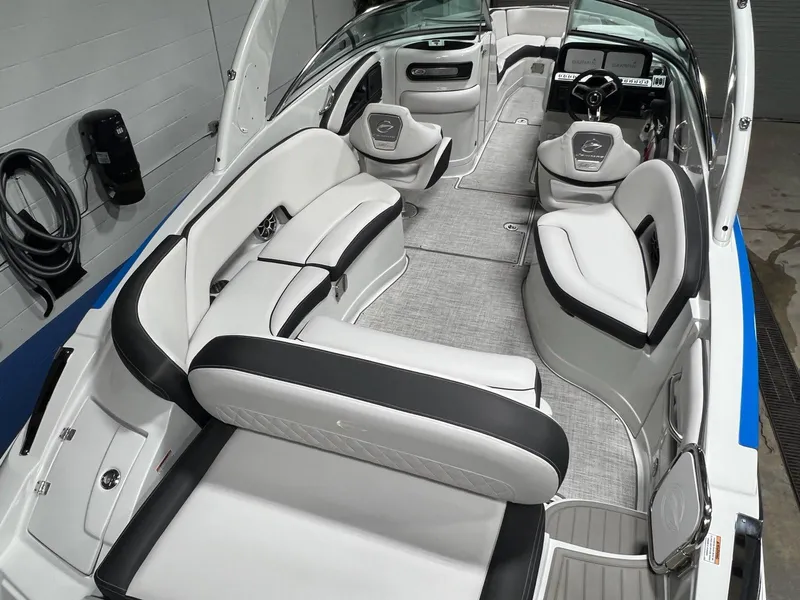 Slide: The Image of 2023 Crownline 290 SS boat interior with luxurious seating and modern design. - 4