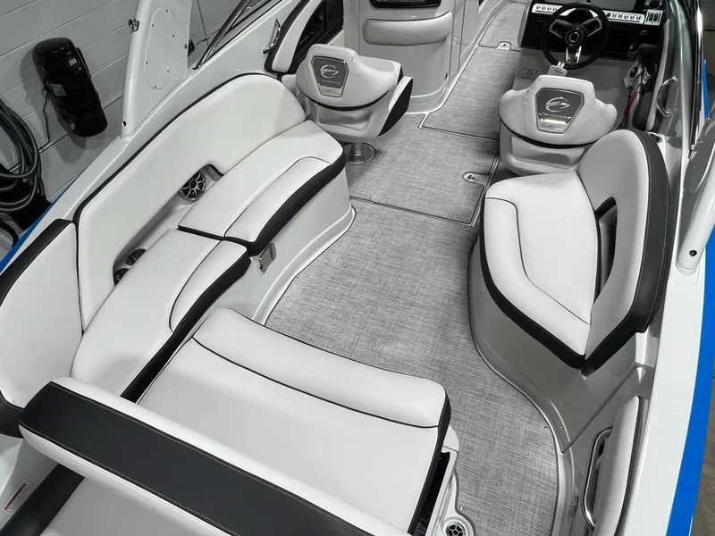 Slide: The Image of 2023 Crownline 290 SS boat interior with luxurious seating and modern design. - 5