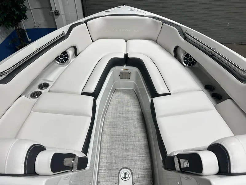 Slide: The Image of 2023 Crownline 290 SS boat interior with white and black seating. - 7