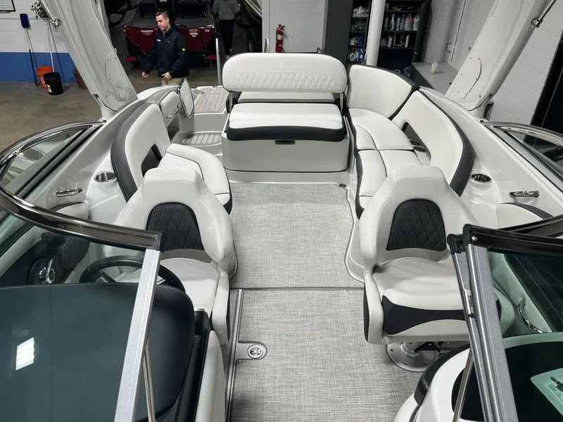 Slide: The Image of 2023 Crownline 290 SS boat interior with luxurious seating and modern design. - 8