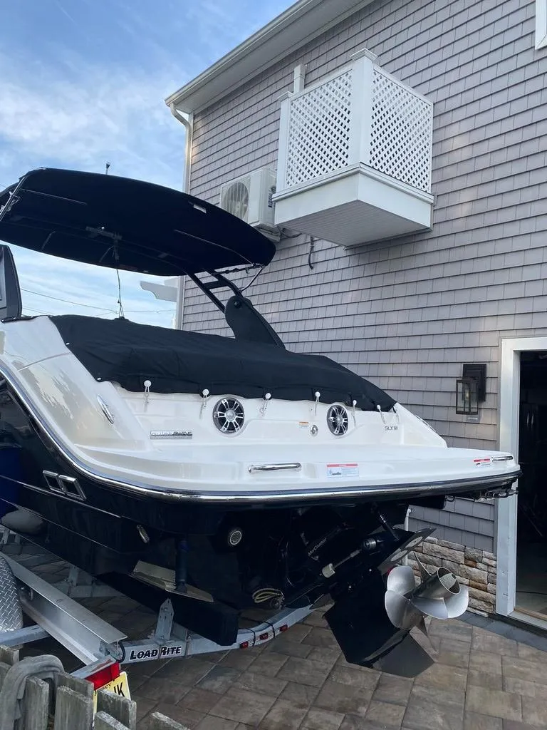 Slide: The Image of 2020 Sea Ray SLX 250 boat parked at dock. - 3