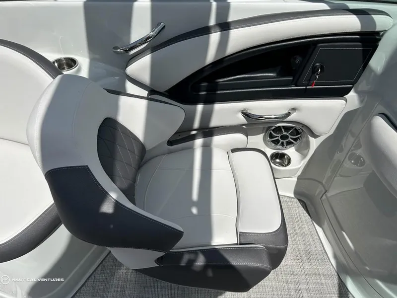 Slide: The Image of 2024 Crownline E290 XS boat interior with premium seating and modern design. - 6