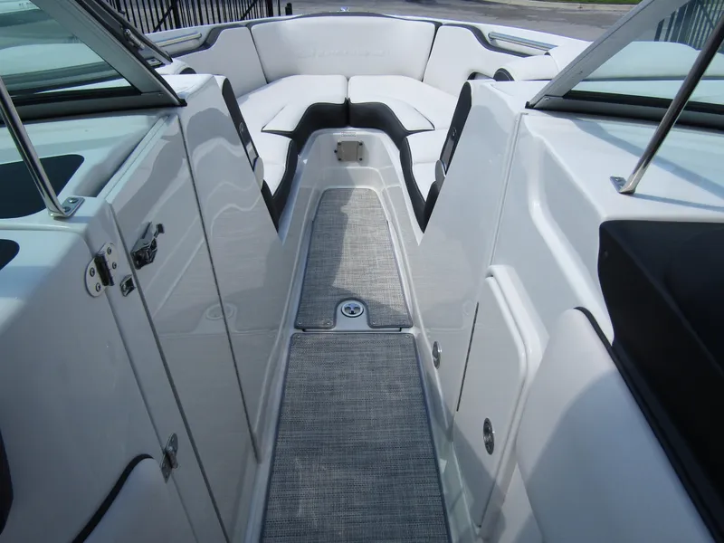 Slide: The Image of 2024 Crownline 270 XSS boat interior with sleek seating and modern design. - 12