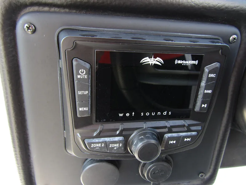 Slide: The Image of Wet Sounds audio system in 2024 Crownline 270 XSS boat dashboard. - 19