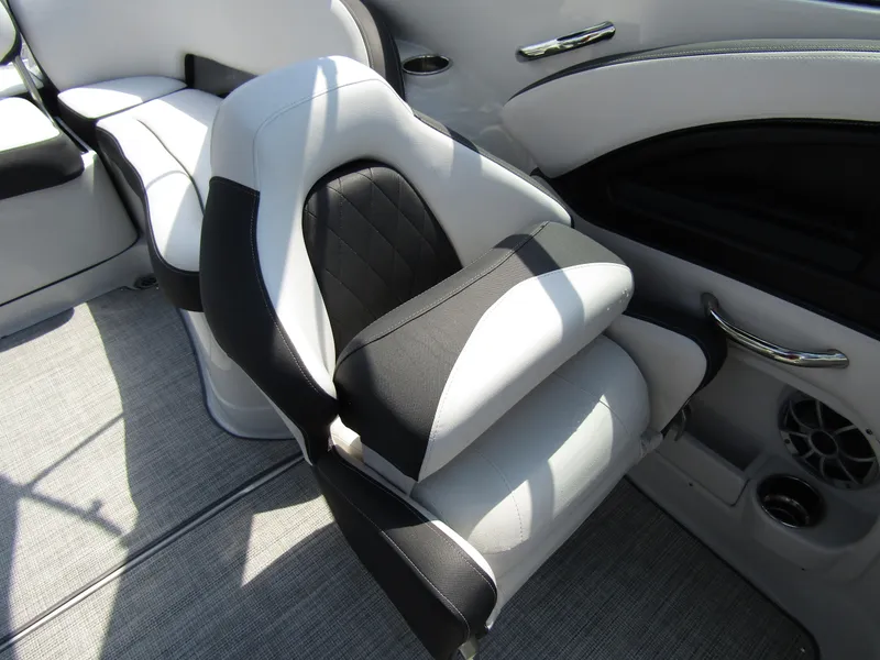 Slide: The Image of 2024 Crownline 270 XSS boat interior with sleek, modern seating design. - 27