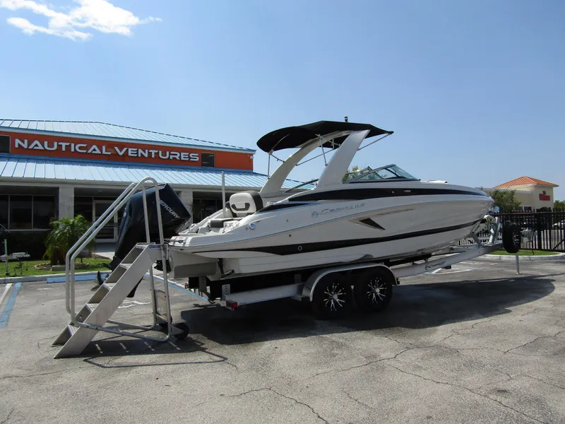 Slide: The Image of 2024 Crownline 270 XSS boat on trailer at Nautical Ventures dealership. - 3