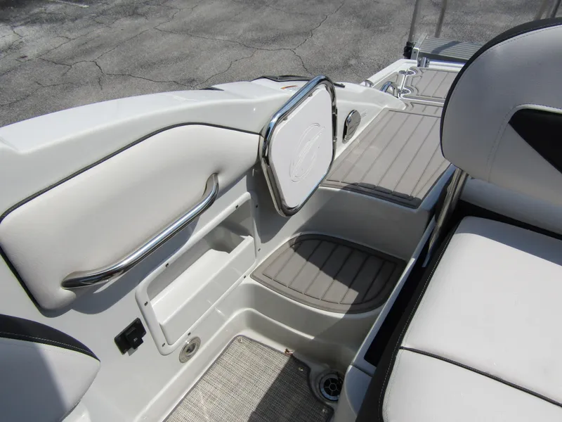 Slide: The Image of 2024 Crownline 270 XSS boat interior with sleek seating and modern design. - 30