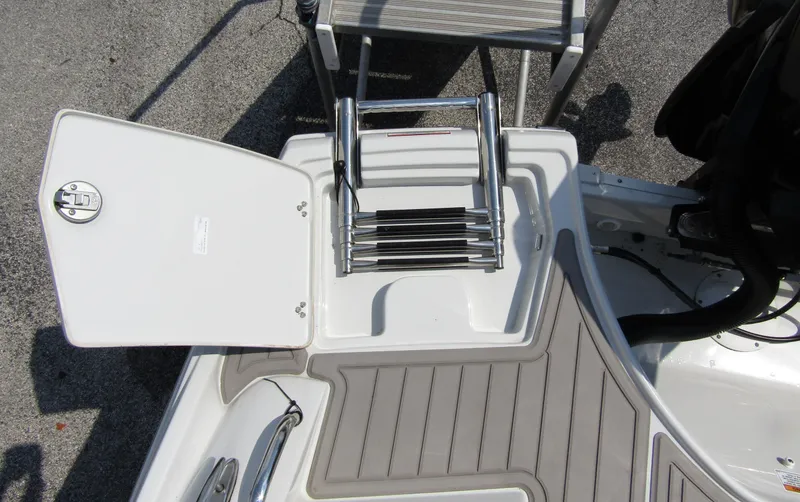 Slide: The Image of 2024 Crownline 270 XSS boat swim platform with foldable ladder. - 34