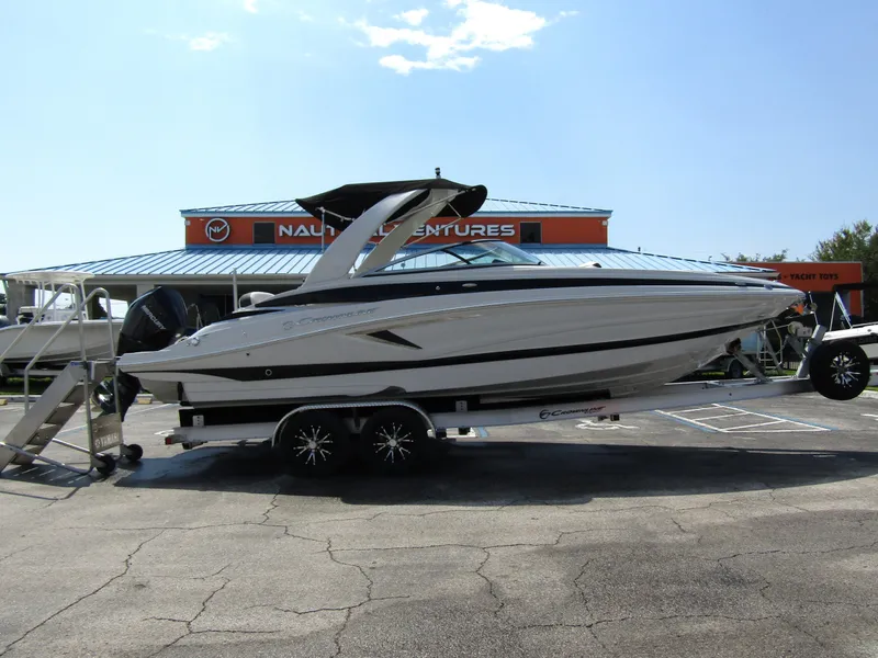 Slide: The Image of 2024 Crownline 270 XSS boat on trailer at dealership. - 4