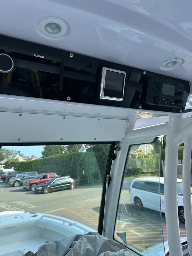 Slide: The Image of Interior view of a 2021 Everglades 253 boat with electronic equipment. - 9