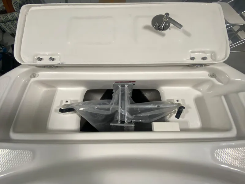 Slide: The Image of 2024 Robalo R222 Center Console anchor storage compartment. - 20