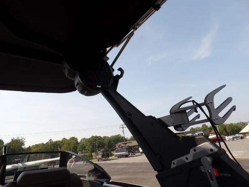 Slide: The Image of 2024 Malibu 23 LSV boat interior with wakeboard rack and tower. - 12