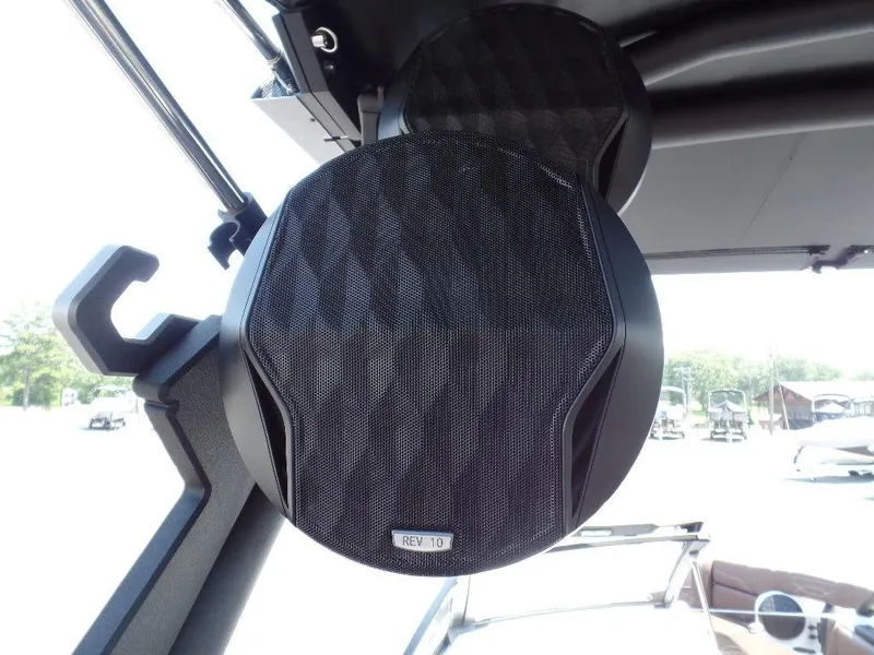 Slide: The Image of 2024 Malibu 26 LSV boat speaker, black, mounted on interior frame. - 11