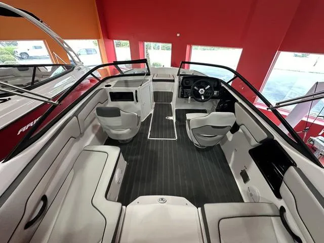 Slide: The Image of 2024 Yamaha Boats SX190 interior, spacious seating, modern dashboard, and sleek design. - 6