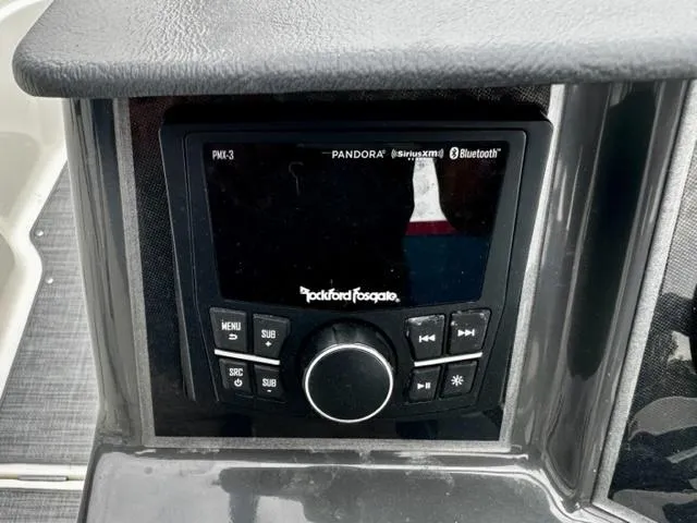 Slide: The Image of Rockford Fosgate audio system on 2022 Bayliner VR5 boat dashboard. - 12