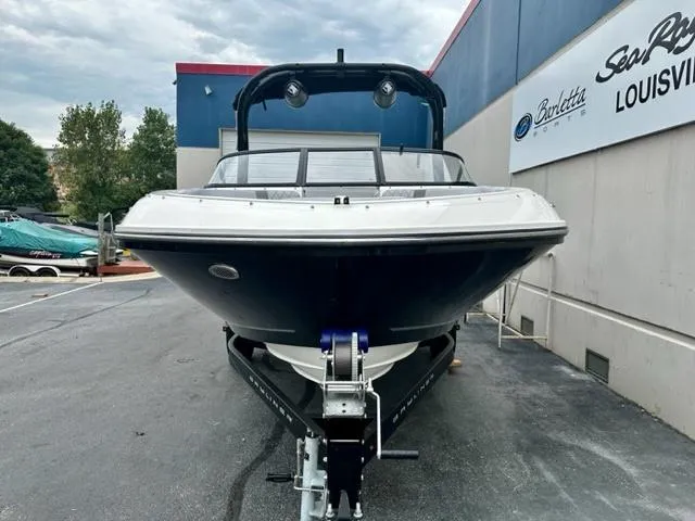 Slide: The Image of 2022 Bayliner VR5 boat on a trailer at a dealership. - 2