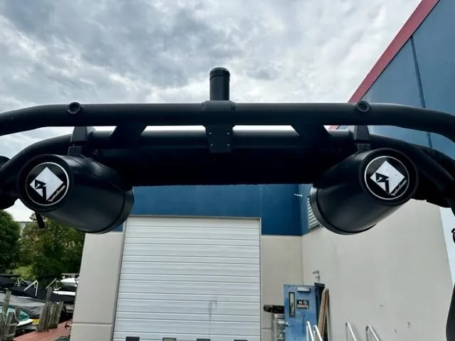 Slide: The Image of 2022 Bayliner VR5 boat speakers and wakeboard tower against a cloudy sky. - 9