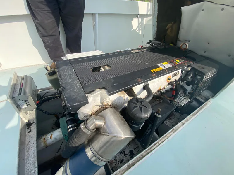 Slide: The Image of 2006 Kryptonite 41 CC boat engine in open compartment. - 13