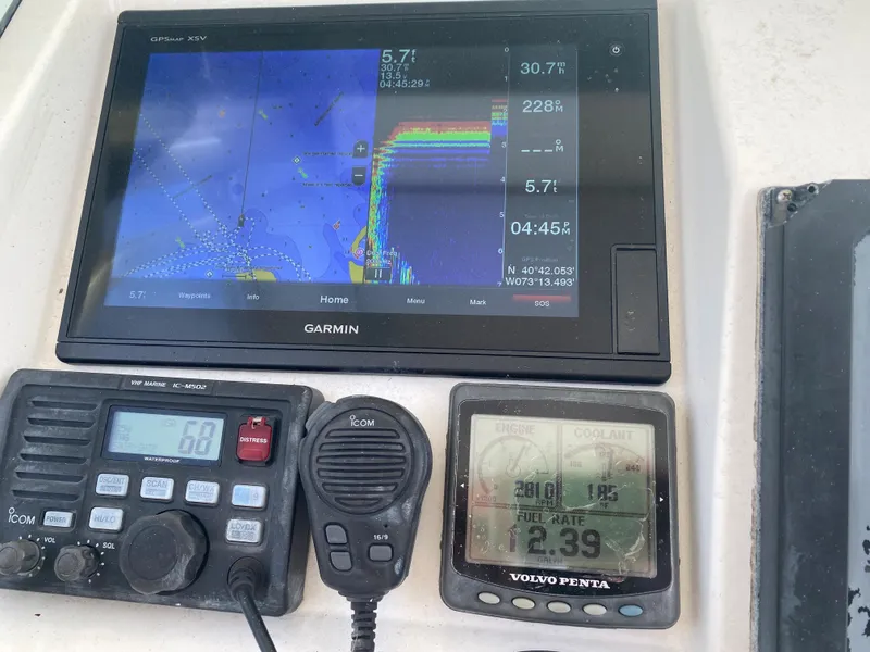 Slide: The Image of Boat navigation and communication equipment on a 2006 Kryptonite 41 CC. - 19