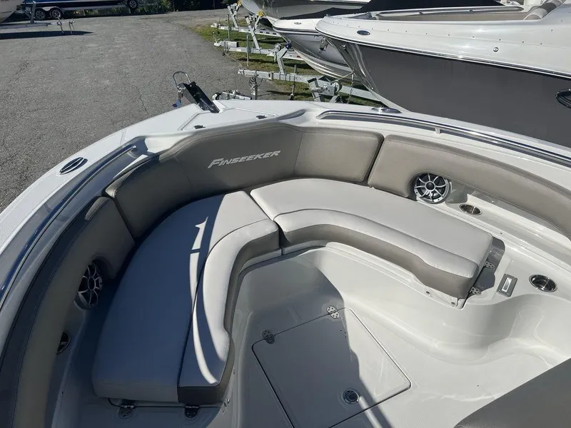 Slide: The Image of 2024 Finseeker 210 FS boat with spacious seating and modern design. - 9