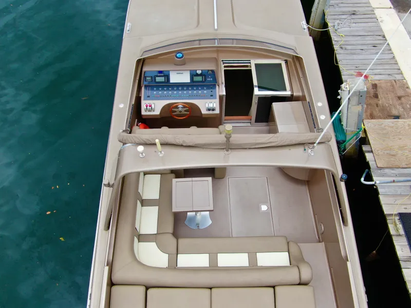 Slide: The Image of Overhead view of 1998 Magnum 50 Bestia yacht interior and control panel. - 8