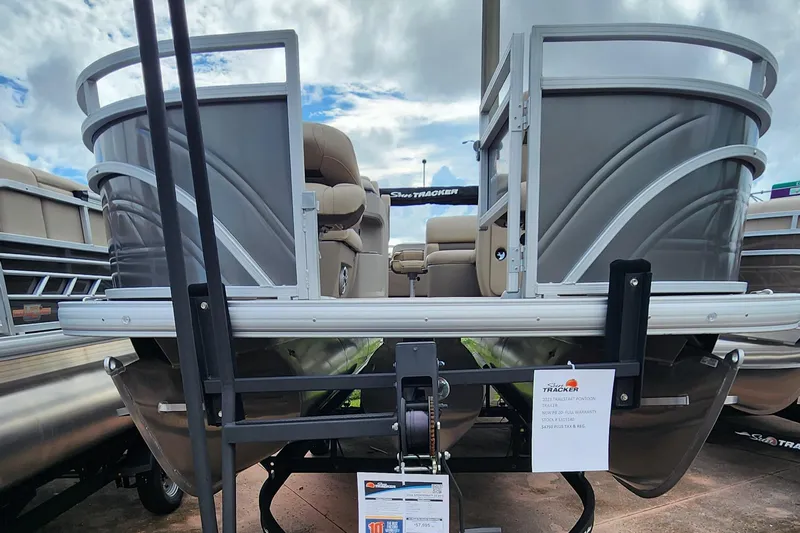 Slide: The Image of 2024 Sun Tracker Fishin' Barge 22 XP3 pontoon boat, rear view, on display. - 6
