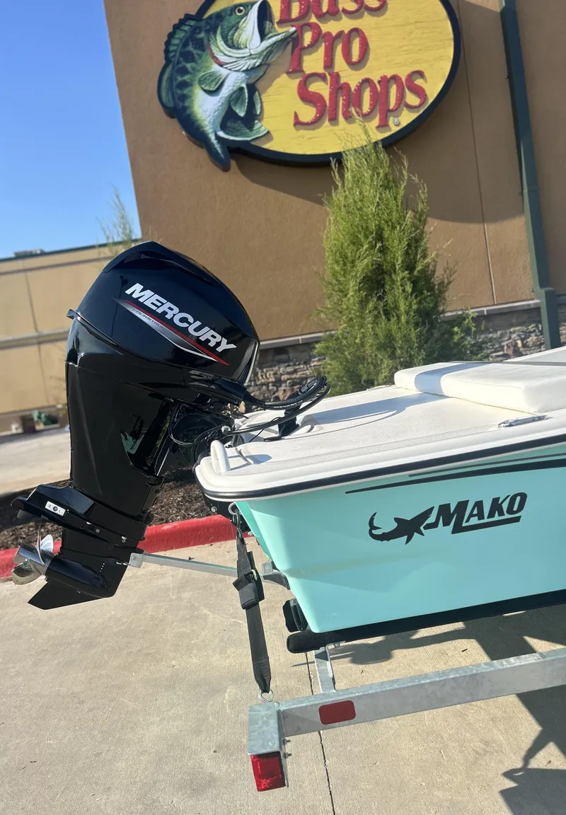 Slide: The Image of 2024 Mako Pro Skiff 13 CC with Mercury engine at Bass Pro Shops. - 2
