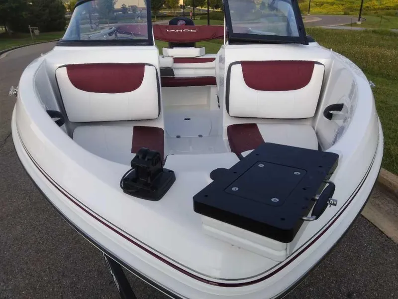 Slide: The Image of 2024 Tahoe 185 S boat interior with red and white seating. - 4