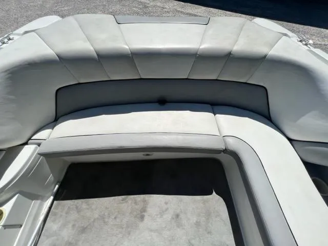 Slide: The Image of 2001 Cobalt 190 boat interior seating area with gray upholstery. - 10