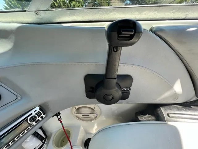 Slide: The Image of 2001 Cobalt 190 boat interior, throttle control and audio system. - 14