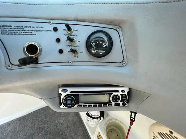 Slide: The Image of Cobalt 190 2001 boat dashboard with fuel gauge and stereo system. - 15