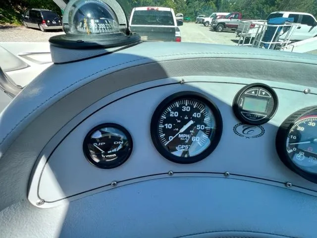Slide: The Image of Dashboard of a 2001 Cobalt 190 boat with speedometer and gauges. - 17