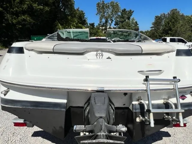 Slide: The Image of 2001 Cobalt 190 boat rear view with ladder and outboard motor. - 6