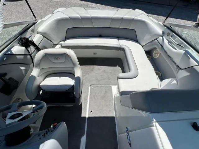 Slide: The Image of 2001 Cobalt 190 boat interior with white and gray seating. - 9