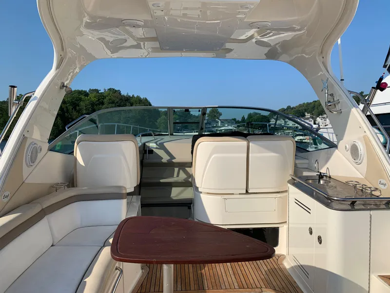 Slide: The Image of Interior of a 2012 Sea Ray Sundancer 370 yacht with seating area. - 19