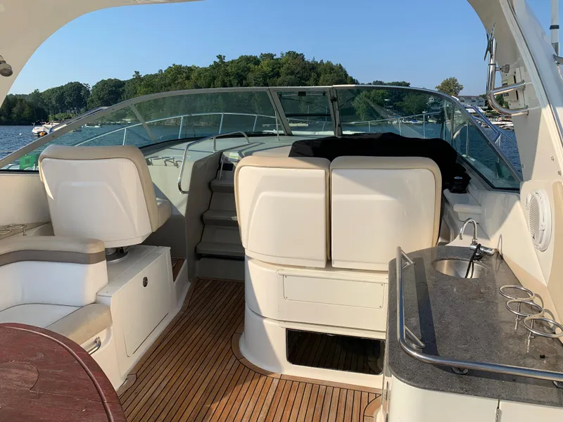 Slide: The Image of Interior of a 2012 Sea Ray Sundancer 370 yacht with seating area. - 22