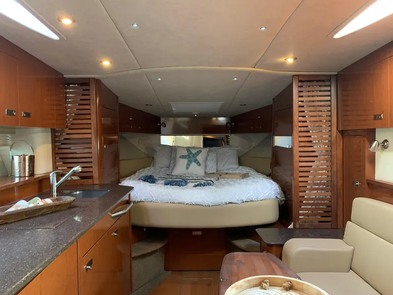 Slide: The Image of Interior of 2012 Sea Ray Sundancer 370 yacht with luxurious bedroom. - 27
