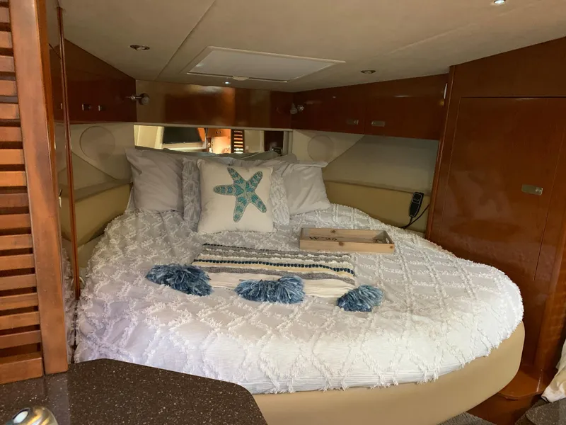 Slide: The Image of Interior of Sea Ray Sundancer 370 yacht, cozy bedroom with bed. - 28