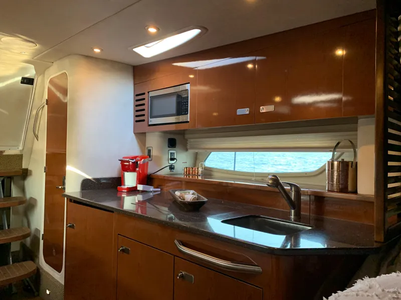 Slide: The Image of Interior of 2012 Sea Ray Sundancer 370 yacht kitchen. - 30
