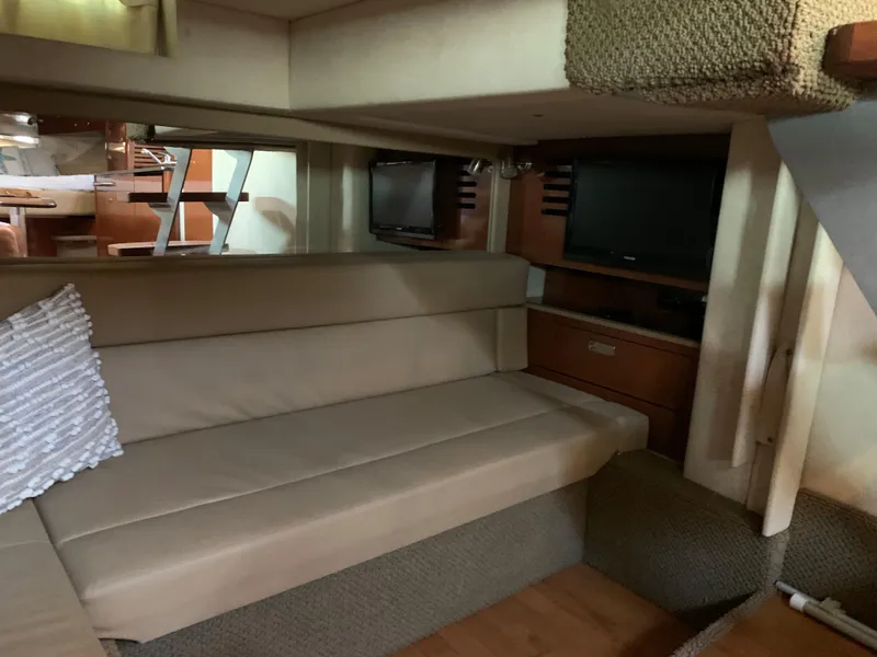 Slide: The Image of Interior of 2012 Sea Ray Sundancer 370 yacht with beige sofa. - 36